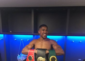 Anthony Joshua with his belts