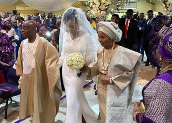 Bishop Oyedepo and wife, walk their daughter, Joy down the wedding aisle (photos)