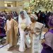 Bishop Oyedepo and wife, walk their daughter, Joy down the wedding aisle (photos)