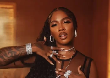 Tiwa Savage tattoo heartbreak